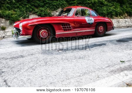 GOLA DEL FURLO, ITALY - MAY 19: MERCEDES-BENZ 300 SL COUPÉ W 198 1955 on an old racing car in rally Mille Miglia 2017 the famous italian historical race (1927-1957) on May 19 2017