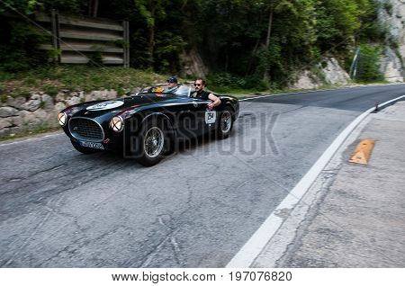 GOLA DEL FURLO, ITALY - MAY 19: FERRARI 225 S SPIDER VIGNALE 1952 on an old racing car in rally Mille Miglia 2017 the famous italian historical race (1927-1957) on May 19 2017