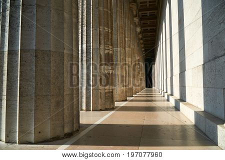 Pillars in light and shadow at walhalla, famous memorial near regensburg in bavaria, germany