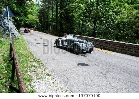 GOLA DEL FURLO, ITALY - MAY 19: BMW 328 1939 on an old racing car in rally Mille Miglia 2017 the famous italian historical race (1927-1957) on May 19 2017