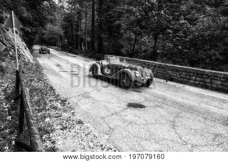 GOLA DEL FURLO, ITALY - MAY 19: BMW 328 1939 on an old racing car in rally Mille Miglia 2017 the famous italian historical race (1927-1957) on May 19 2017