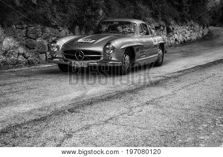 GOLA DEL FURLO, ITALY - MAY 19: MERCEDES-BENZ 300 SL COUPÉ W 198 LEICHTBAU 1955 on an old racing car in rally Mille Miglia 2017 the famous italian historical race (1927-1957) on May 19 201