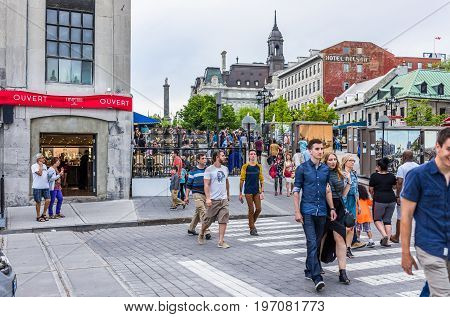 Montreal, Canada - May 27, 2017: People Crossing Road In Old Town Jacques Cartier Square Area In Cit