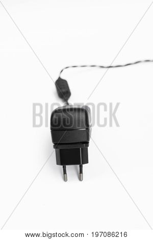 ac to dc adapter in white background
