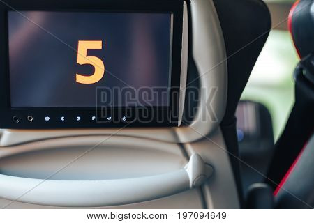 Long-distance international bus of the raised comfort with built in seat chair, a TV or a tablet where they can watch movies during road and listen to music, surf the Internet