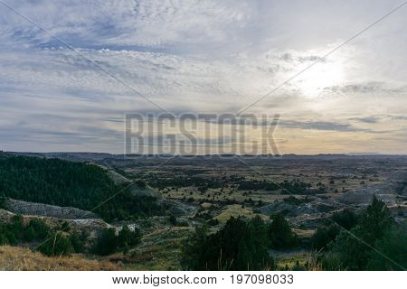 Dusk comes to the plains as seen from the bluffs in Theodore Roosevelt National Park