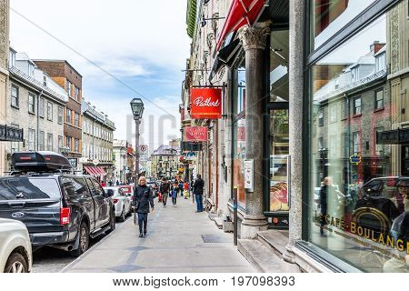 Quebec City, Canada - May 29, 2017: Old Town Street With People Walking By Restaurants And Paillard