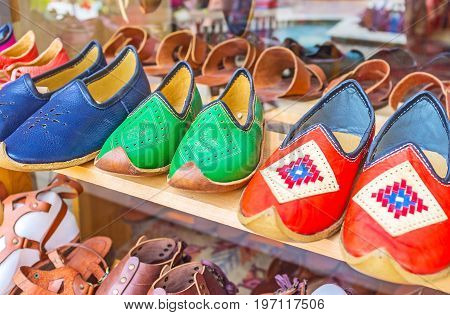 Colorful handmade genuine leather traditional Yemeni shoes in Grand Bazaar of Alanya Turkey.