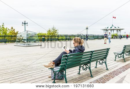 Quebec City, Canada - May 29, 2017: Old Town View Of Dufferin Terrace Wooden Boardwalk With Young Wo