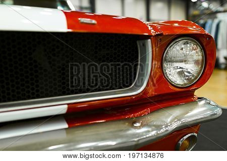 Sankt-Petersburg Russia July 21 2017: Front view of Classic retro Ford Mustang GT.Car exterior details. Headlight of a retro car. Photo Taken on Royal Auto Show July 21