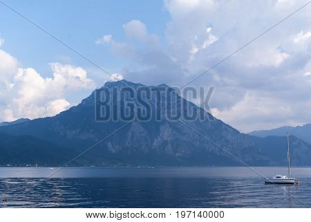 View of mountens and sailing boat background