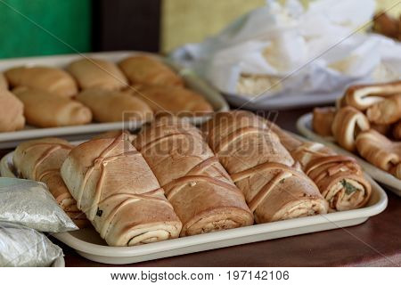 Lying bundles of smoked cheese in Adygea, Russia.