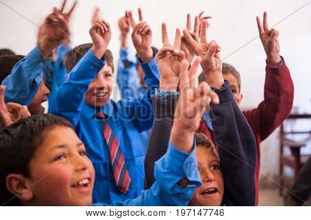 SKARDU, PAKISTAN - APRIL 17: An unidentified Children in a village in the south of Skardu are learning in the classroom of the village school April 17, 2015 in Skardu, Pakistan.