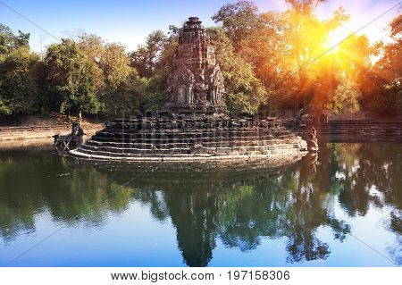 ruins of a fencing of a sacred reservoir when approaching to the temple Neak Pean(12th Century) near Siem Reap Cambodia