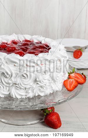 Delicious strawberry white cake shot close-up in decor
