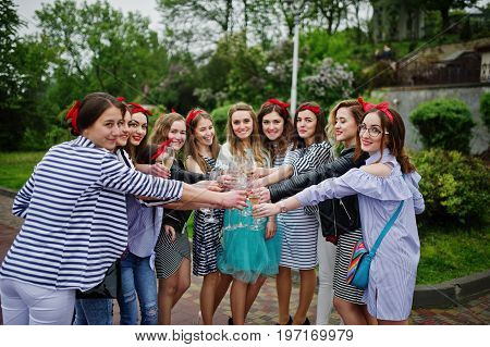 Eleven Attractive Braidsmaids With Lovely Bride Celebrating Bachelorette Party With Champagne In The