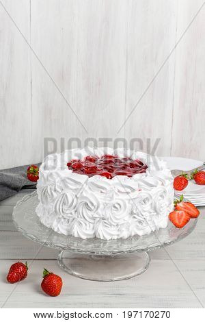 Delicious strawberry white cake shot close-up in decor