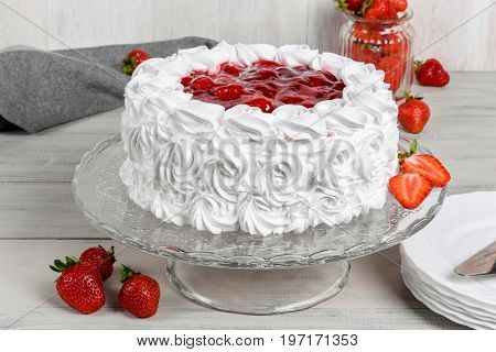 Delicious strawberry white cake shot close-up in decor
