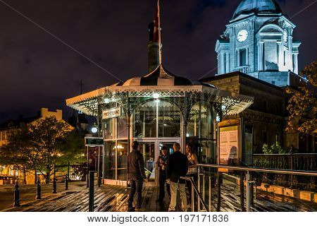 Quebec City, Canada - May 31, 2017: Old Town View Of People On Dufferin Terrace At Night With Illumi