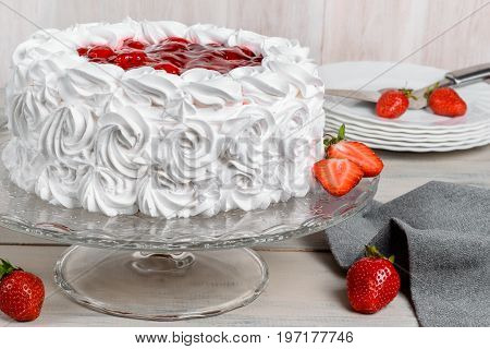 Delicious strawberry white cake shot close-up in decor