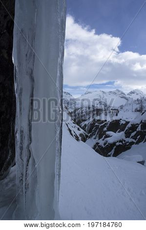frozen waterfall in formazza valley during winter
