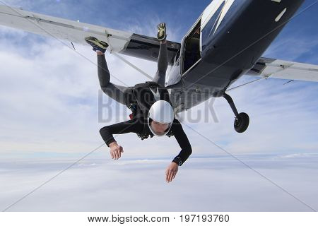 Skydiving over beautiful Norway. Clouds, sun and sky
