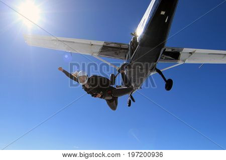 Skydiving over beautiful Norway. Clouds, sun and sky