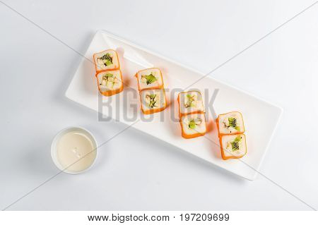 Dessert Maki Sushi - Roll With Various Fruit In Rice Pudding And Coconut Flakes