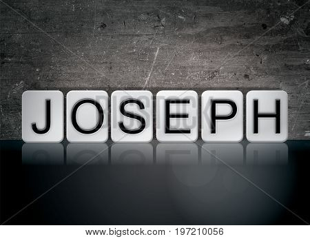 The word Joseph concept and theme written in 3D white tiles on a dark background.