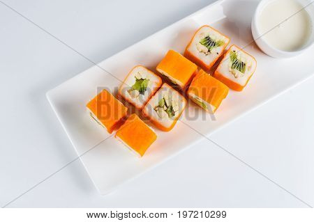 Dessert Maki Sushi - Roll With Various Fruit In Rice Pudding And Coconut Flakes