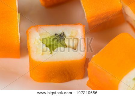 Dessert Maki Sushi - Roll With Various Fruit In Rice Pudding And Coconut Flakes
