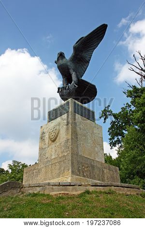 The falcon sculpture on the top of Mogila an artifical hill in Maksimir park Zagreb