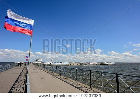 PETERHOF/ RUSSIA - JULY 2, 2017.  Passenger mooring Peterhof for hydrofoil boats, of the type Meteor, located at the open coast of Gulf of Finland, in Petergof (suburb of St. Petersburg), Russia