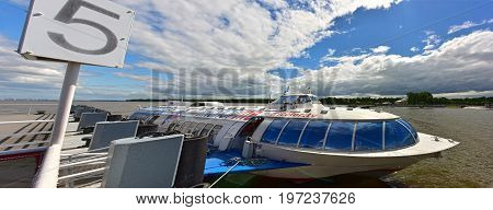 PETERHOF/ RUSSIA - JULY 2, 2017.  Passenger mooring Peterhof for hydrofoil boats, of the type Meteor, located at the open coast of Gulf of Finland, in Petergof (suburb of St. Petersburg), Russia