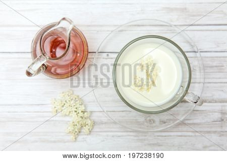 Elderflower (Sambucus nigra) milk and honey infusion for cough treatment