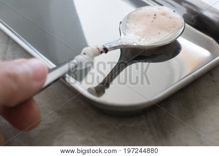 Shiny milk chocolate stain spoon stock photo