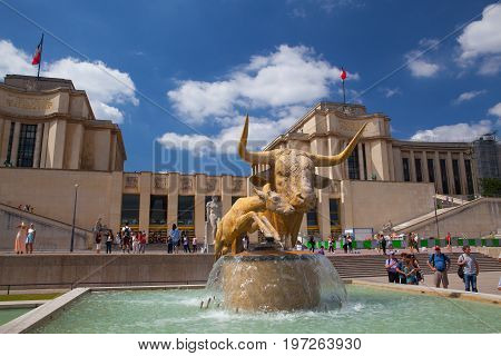 Paris France - June 17 2017: Sculpture of the bull and the deer by Paul Jouve front of the Palais de Chaillot. The work was made for the Universal Exhibition of 1937 in the gardens of the Trocadero.