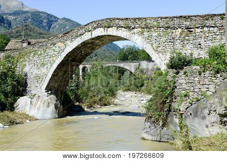 Roman Bridge At Giornico On Leventina Valley