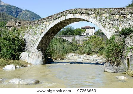 Giornico, Switzerland - 7 June 2016:Roman bridge at Giornico on Leventina valley Switzerland