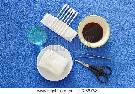 first aid kits for basic cleaning injury wound on blue valvet desk