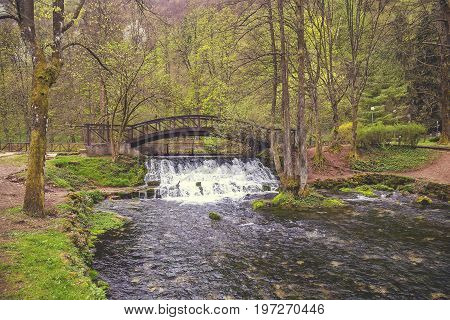 Wooden Bridge With Waterfall In Nature Park Vrelo Bosne 2