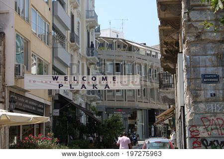 Athens, Greece: July 14, 2017 - The Plaka is the oldest section of Athens. Area of restaurants, Jewelry stores tourist shops, and cafes.