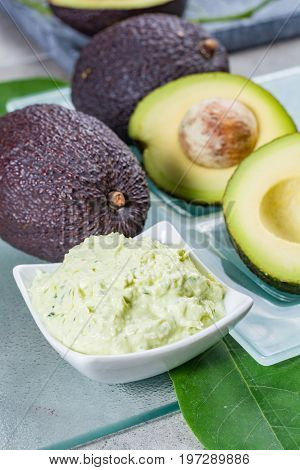 Avocado skin & hair care home spa ripe avocados and bowl with homemade fresh avocado mask nature laboratory