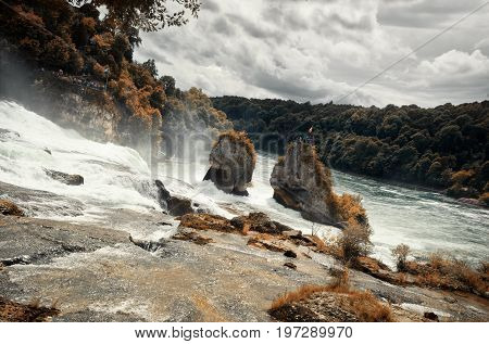 The wild and big Rheinfall Waterfall in Switzerland