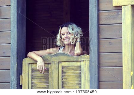 Portrait of a girl in a summer park outdoors