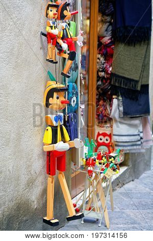 Street Souvenir Shop With Wooden Pinocchio Puppets Siena