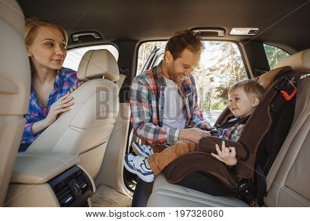 Travel by car family ride together child safety