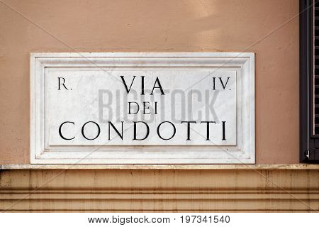 Via Dei Condotti Street Sign On Wall In Rome