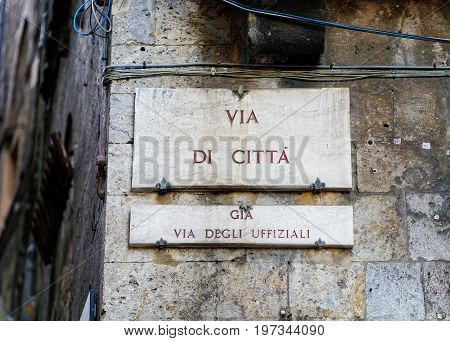 Via Di Citta Street Sign Of Wall In Siena
