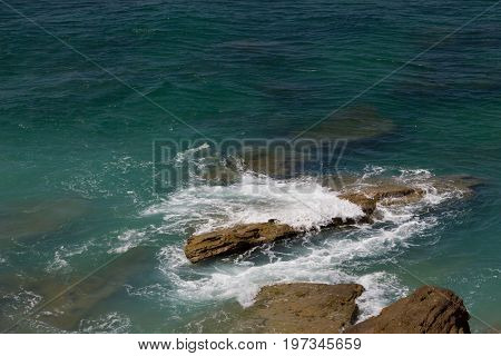 View at Cape Trafalgrar turquoise sea ocean white foam
